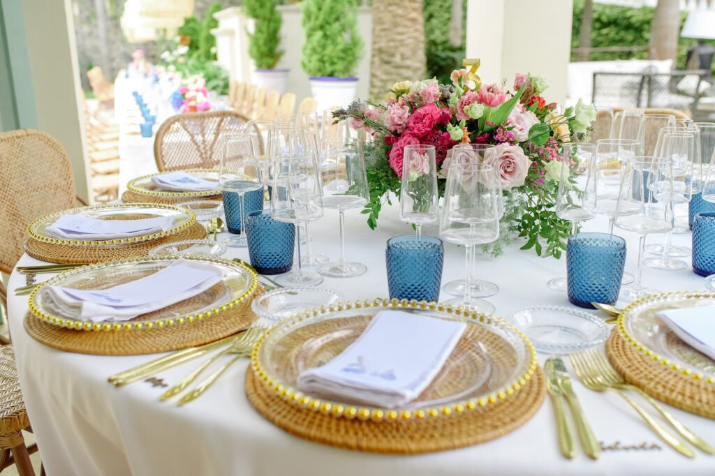 Banquet table with flowers and tableware